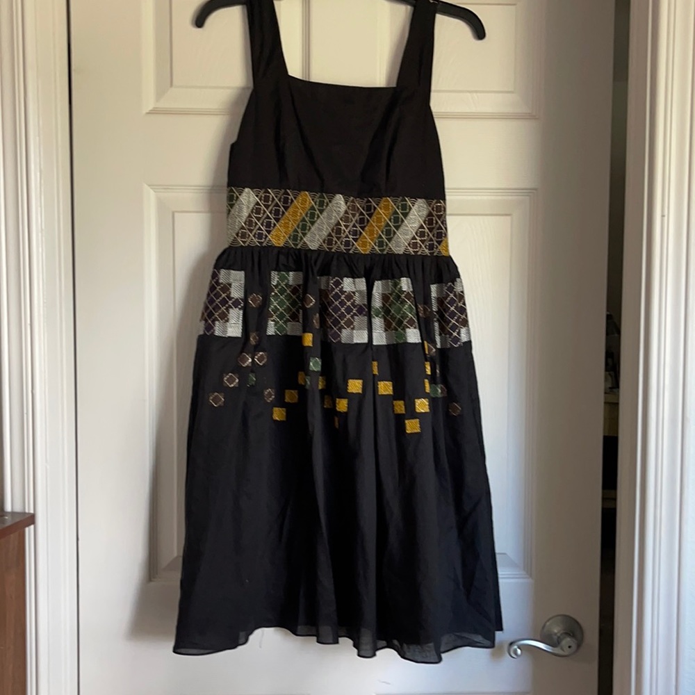 Hand-made summer dress with embodied pattern
